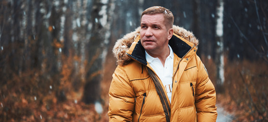 Middle aged caucasian man in the winter park © spaxiax