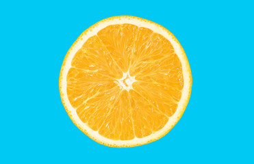 Fresh orange fruit isolated on blue background