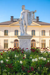 Fototapeta na wymiar Staue at the garden of the Drottningholm Palace. It's is an UNESCO World Heritage Site. It was added to the list in 1991.