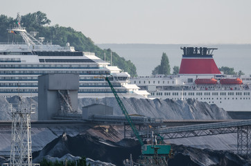SEA COAST LANDSCAPE - Cruise ship, passenger ferry and coal quay at the sea port