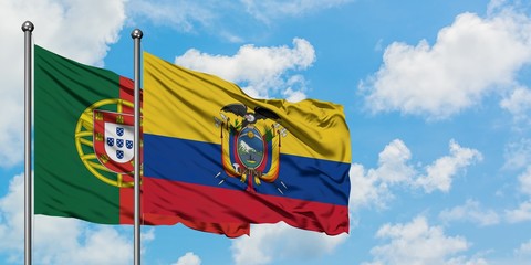 Portugal and Ecuador flag waving in the wind against white cloudy blue sky together. Diplomacy concept, international relations.