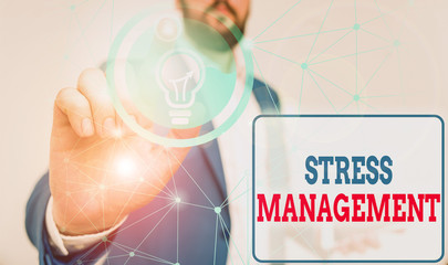 Writing note showing Stress Management. Business concept for method of limiting stress and its effects by learning ways Male human wear formal suit presenting using smart device