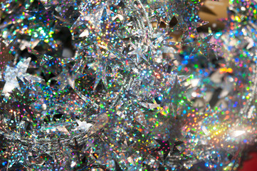 Christmas – New Year decoration abstract background with ornamental stars and shiny glitters