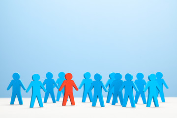 Team Leader. HR. The right choice of staff. Blue men and red leader