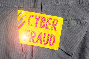 Word writing text Cyber Fraud. Business photo showcasing any crime that is committed with the use of a computer Writing equipment and yellow note paper inside pocket of man work trousers