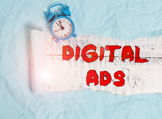 Conceptual hand writing showing Digital Ads. Concept meaning uses the Internet to deliver...