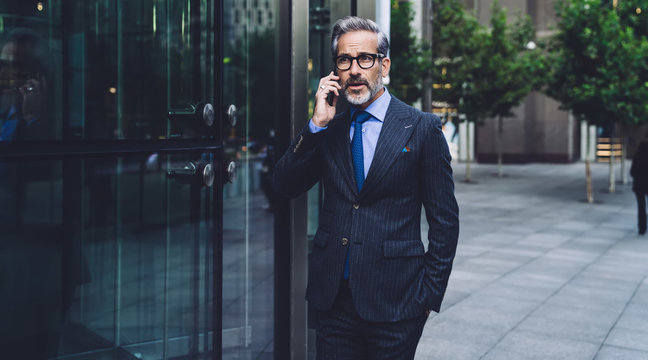 Stylish Businessman Talking On Phone