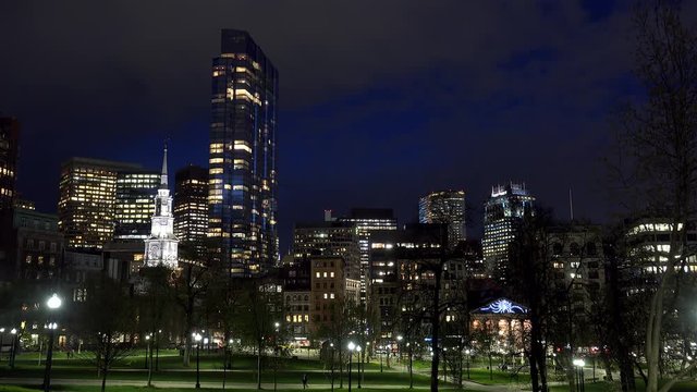  Boston Common Park with the downtown on background by night. Timelapse. Massachusetts, USA