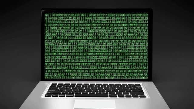 Zoom in laptop screen, Matrix style, binary code