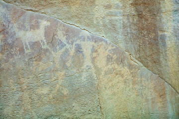 Detail of a part of the petroglyphs incised by the Fremont People in the sandstone rock face at...