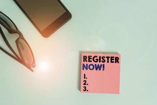 Text sign showing Register Now. Business photo showcasing official list or record showing or things into web or forum Dark eyeglasses colored sticky note smartphone fashion pastel background