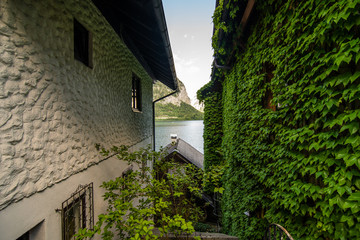 HALLSTATT, AUSTRIA - July, 2019: Town square in Hallstatt, Austria. Hallstatt is historical village located in Austrian Alps at the Hallstatter lake and promoted by UNESCO World Heritage region.