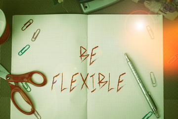 Text sign showing Be Flexible. Business photo text able to be easily modified to respond to altered...