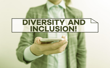 Handwriting text Diversity And Inclusion. Conceptual photo range huanalysis difference includes race ethnicity gender Business concept with mobile phone and business woman