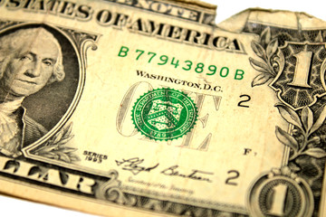 One american dollar, old crumpled bill on white background, front side, close-up