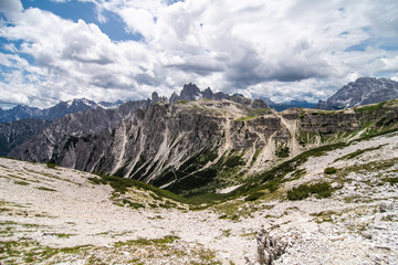 Dolomites, Italy - July, 2019: Amazing panoramic view from Tre Cime over the Dolomite's mountain