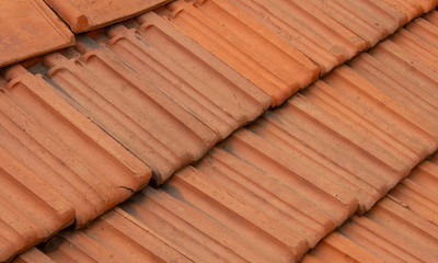 Obraz na płótnie Canvas Roof top tiles arranged in interlocked position on a residential house
