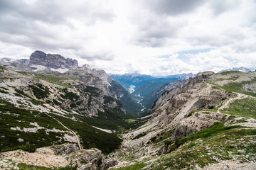 Fototapeta na wymiar Dolomites, Italy - July, 2019: Amazing panoramic view from Tre Cime over the Dolomite's mountain