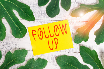 Conceptual hand writing showing Follow Up. Concept meaning a continuation of something that has...