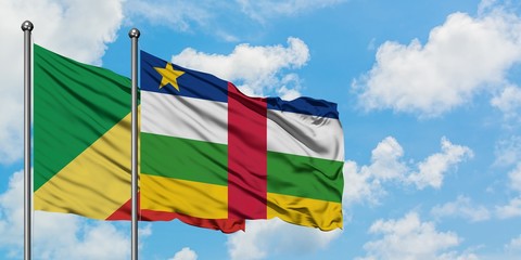 Republic Of The Congo and Central African Republic flag waving in the wind against white cloudy blue sky together. Diplomacy concept, international relations.