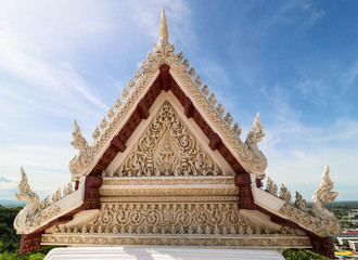 Naklejka premium A beautiful architecture of temple roof in Thailand
