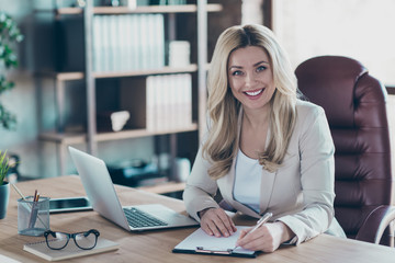Photo of amazing blond business lady notebook table signing contract important partner prepared...