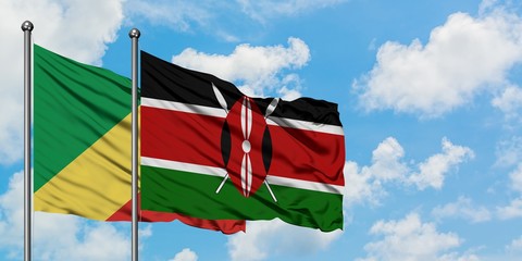 Republic Of The Congo and Kenya flag waving in the wind against white cloudy blue sky together. Diplomacy concept, international relations.