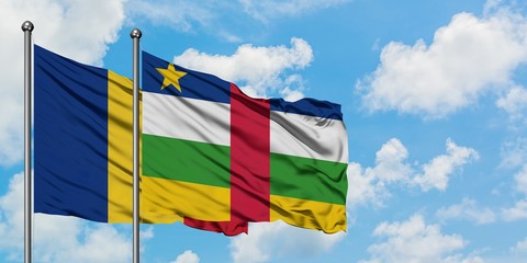 Romania and Central African Republic flag waving in the wind against white cloudy blue sky together. Diplomacy concept, international relations.