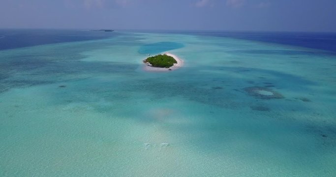 Aerial Wide View Of Tropical Island With Luxury isolated isle Drone