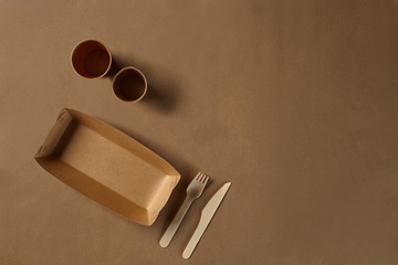 Eco friendly disposable tableware. Biodegradable craft dishes. Recycling concept. Also used in fast...