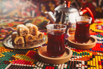 delicious turkish tea on colorful rug