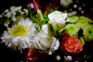 a beautiful white rose in a bouquet
