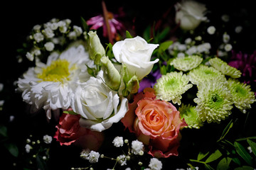 a beautiful white rose in a bouquet