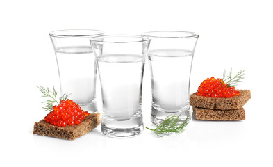 Russian vodka and red caviar sandwiches isolated on white