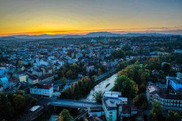 aeria shot of sunrise sun through the city of cesky tesin , poslky tesin 