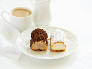 Sectional homemade eclairs, chocolate and vanilla.