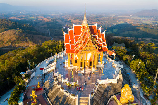 Top view Aerial photo from flying drone.The beautiful  of Thai temple (Wat Pa Phu Hai Long) on the top of mountain  in Pak Chong District,Nakorn Ratchasima, Thailand.