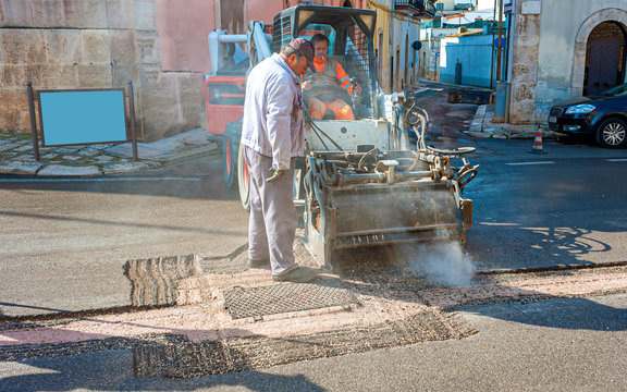 Milling drum for road milling machine. Milling of asphalt for road reconstruction accessory for skid steer