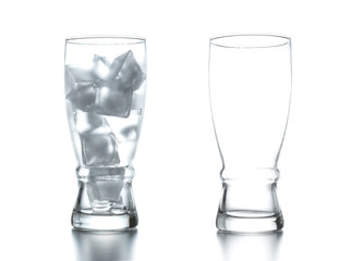 Crystal glass with ice steam on a white background
