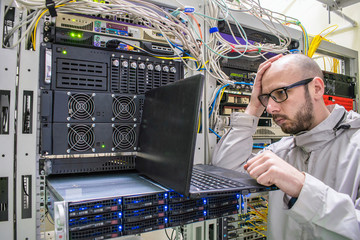 Programmer with glasses made a mistake when working in the server room. The system administrator...