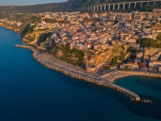 Aerial view of Pizzo Calabro, pier, castle, Calabria, tourism Italy. Panoramic view of the small town of Pizzo Calabro by the sea. Houses on the rock. On the cliff stands the Aragonese castle.