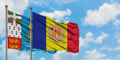 Saint Pierre And Miquelon and Andorra flag waving in the wind against white cloudy blue sky together. Diplomacy concept, international relations.