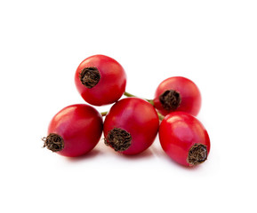 Ripe rose hip isolated on white background