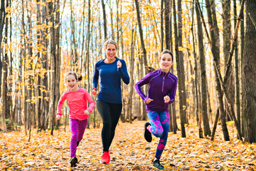 Healthy lifestyle mother and child running outdoor