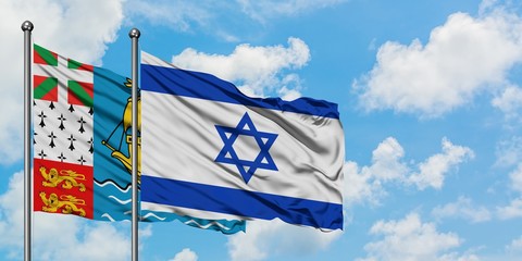 Saint Pierre And Miquelon and Israel flag waving in the wind against white cloudy blue sky together. Diplomacy concept, international relations.