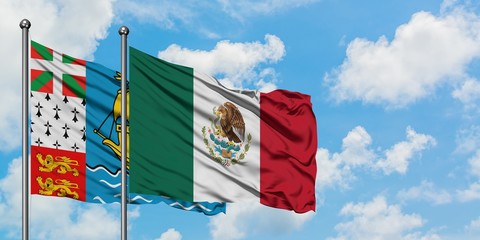 Saint Pierre And Miquelon and Mexico flag waving in the wind against white cloudy blue sky...