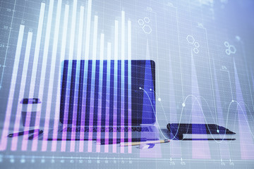 Forex graph hologram with desktop office computer background. Double exposure. Concept of financial analysis.