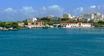 Fototapeta na wymiar Sea view of the sunlit coastline of San Juan, Puerta Rico