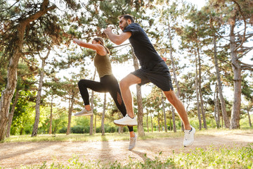 Sports woman and man running outdoors