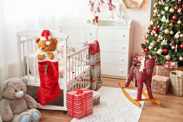 Christmas nursery, Christmas decor in children's bedroom, children's playroom decorated for new...
